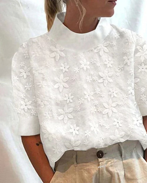 Doutzen | Blusa con cuello alto y bordado de flores